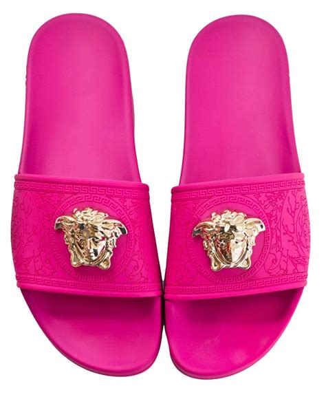 hot pink designer slides.